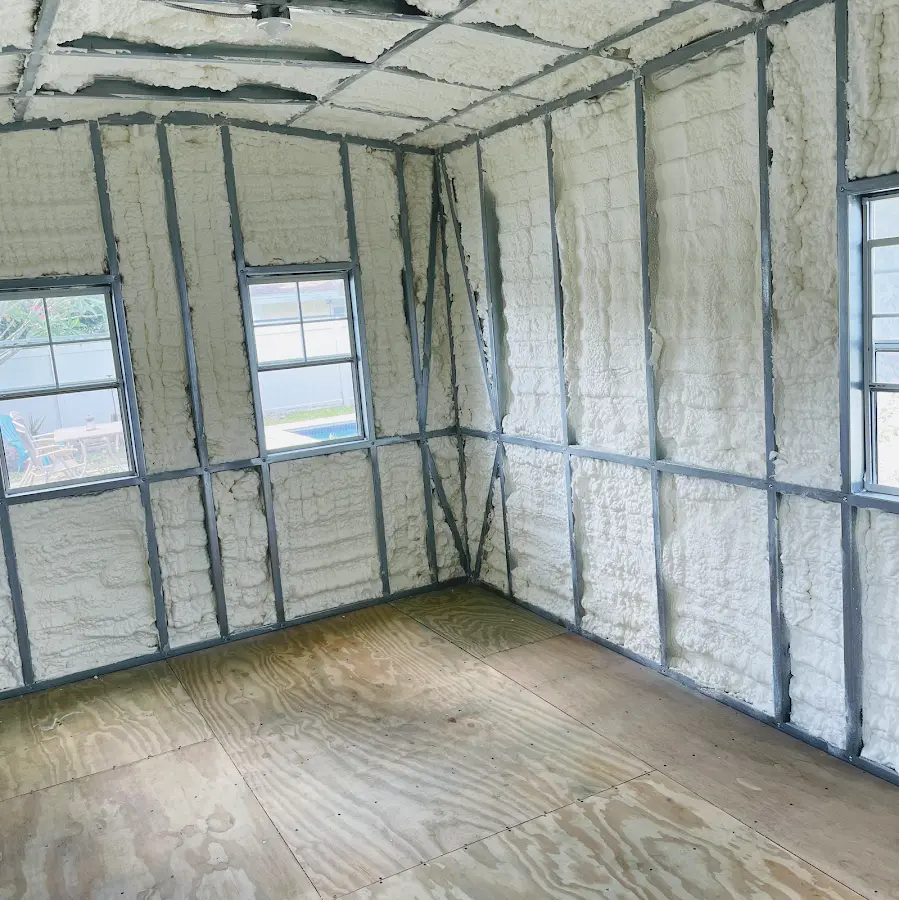 Closed-cell spray foam insulation applied to wall cavities in a residential project in Cahokia Heights